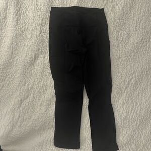 Lululemon black capris with see-thru polka dot. Size 6